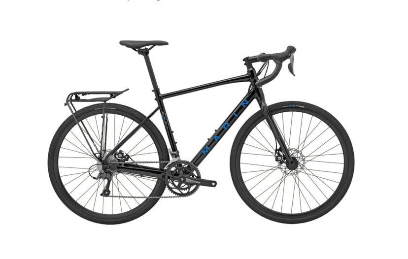 Black Marin touring bicycle with rear rack against a white background
